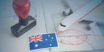 Australian work visa process illustrated with travel documents, immigration stamps, and Australia flag.