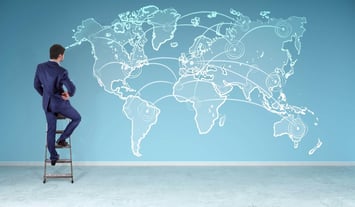 World map background illustrating visa and work permit differences, highlighting what visas and work permits are in global employment and international mobility.