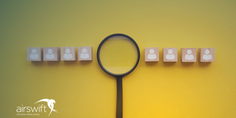 Magnifying glass over candidates