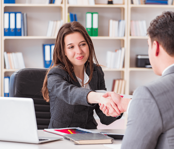Employer and candidate shake hands