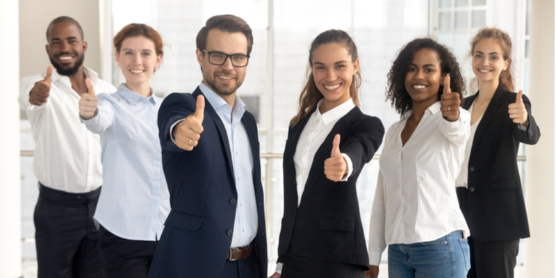 business-leaders-employees-group-showing-thumbs
