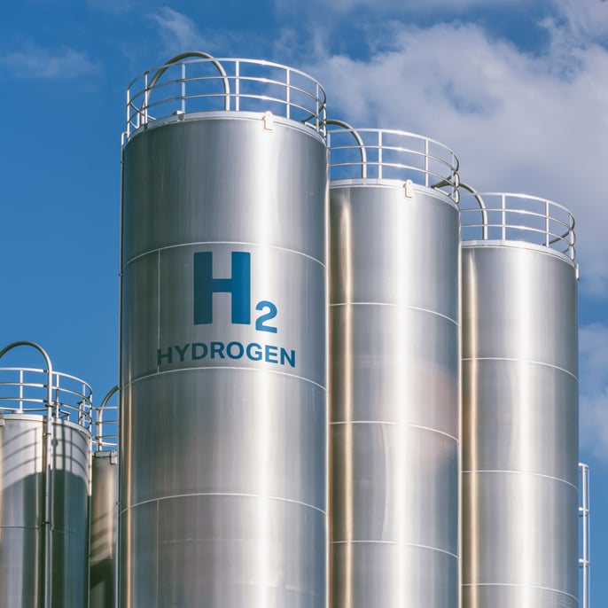 Green hydrogen tankers with the H2 symbol on