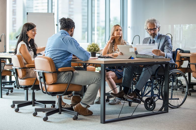 An image of employees working in an office in Germany