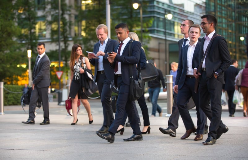 A group of buisness-people walking to work in the UK