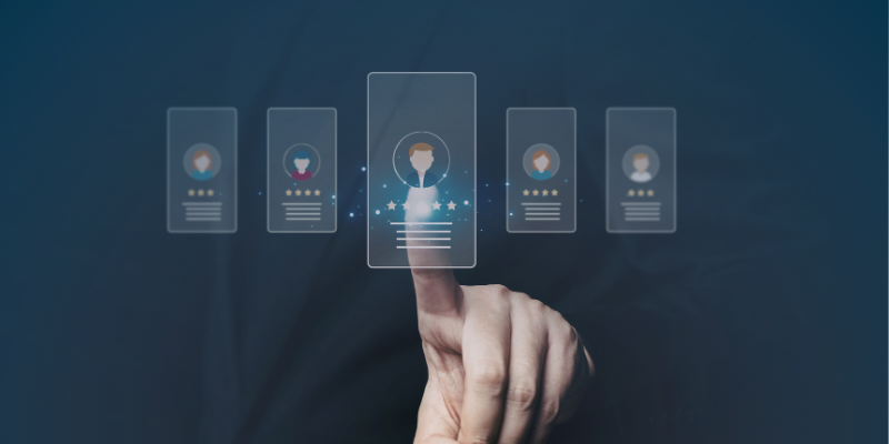 Individual in a suit activating a button with icons, representing the integration of data and technology in STEM talent acquisition.