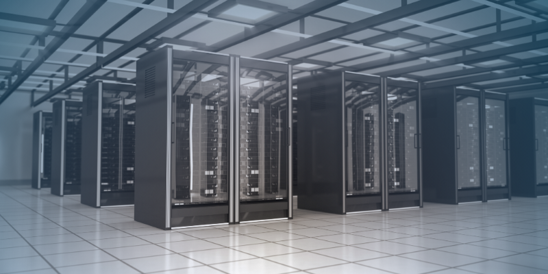 Interior of a modern data centre with rows of server racks, showing critical IT infrastructure 